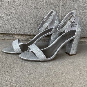 Glittery silver 3 1/2 inch heels.